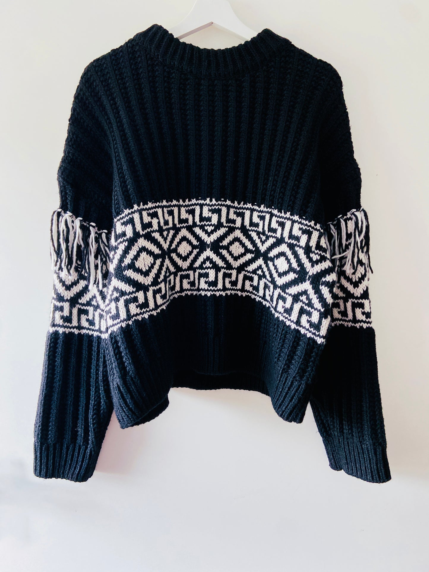 Black ripped bohemian sweater with fringes