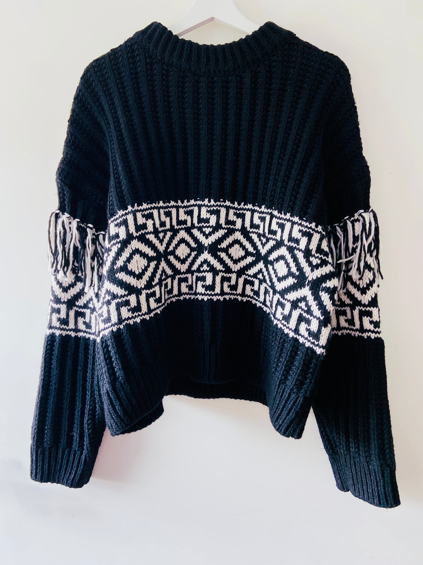 Black ripped bohemian sweater with fringes