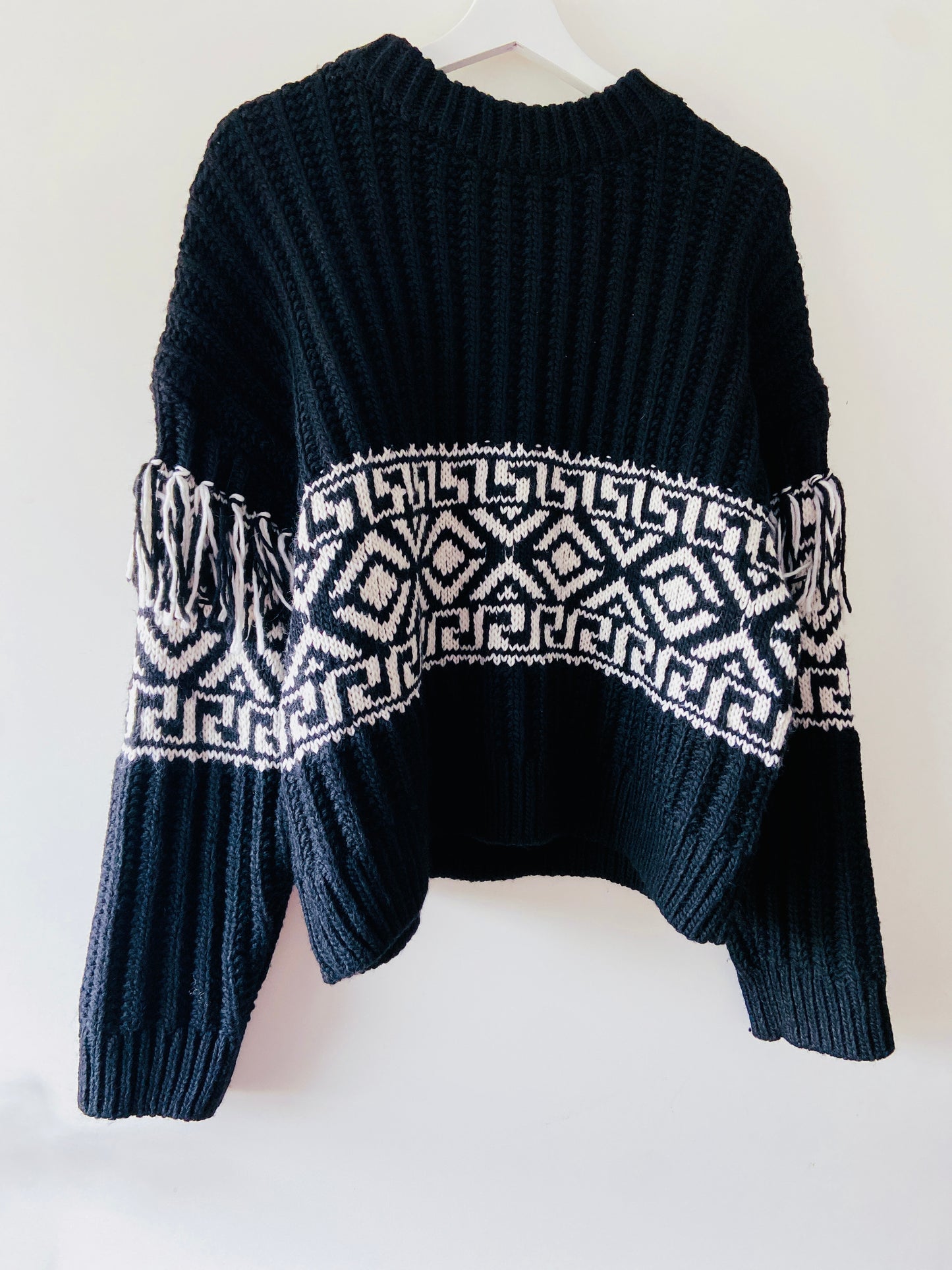 Black ripped bohemian sweater with fringes