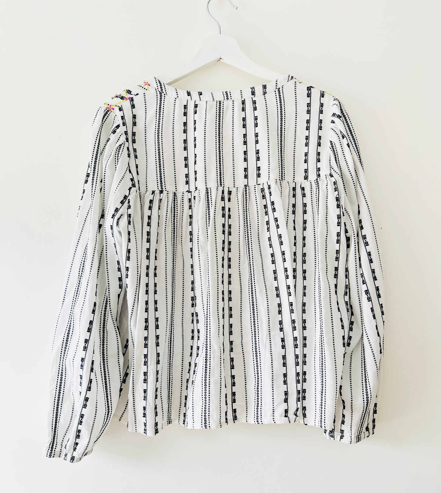 Black and white blouse with embroidery and gold coins