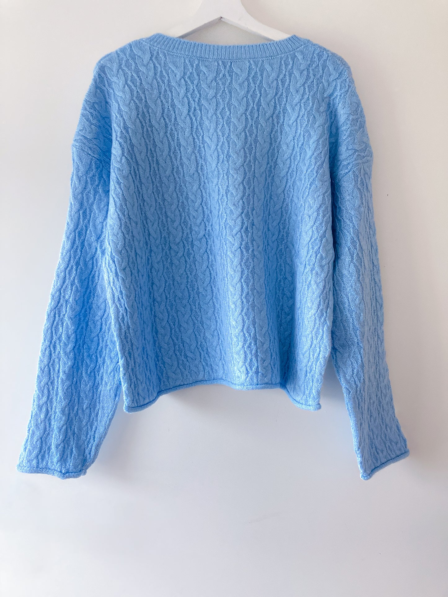 Pull torsadé bleu clair à paillettes Mango