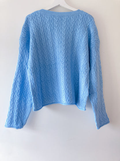 Pull torsadé bleu clair à paillettes Mango