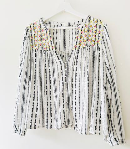 Black and white blouse with embroidery and gold coins
