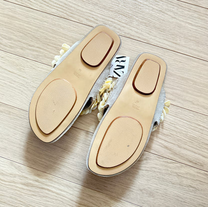 Sandales en cuir à coquillages