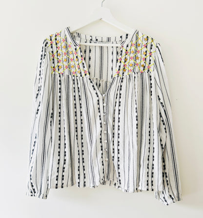 Black and white blouse with embroidery and gold coins