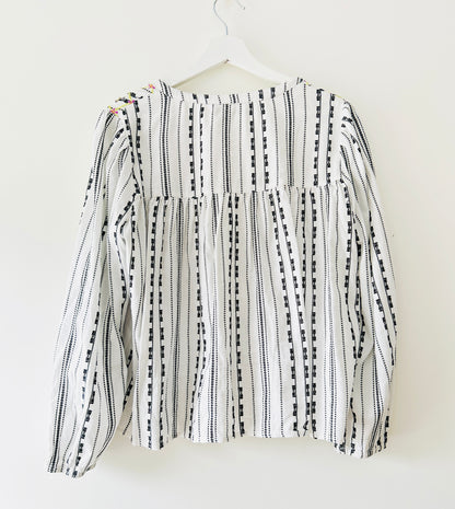 Black and white blouse with embroidery and gold coins